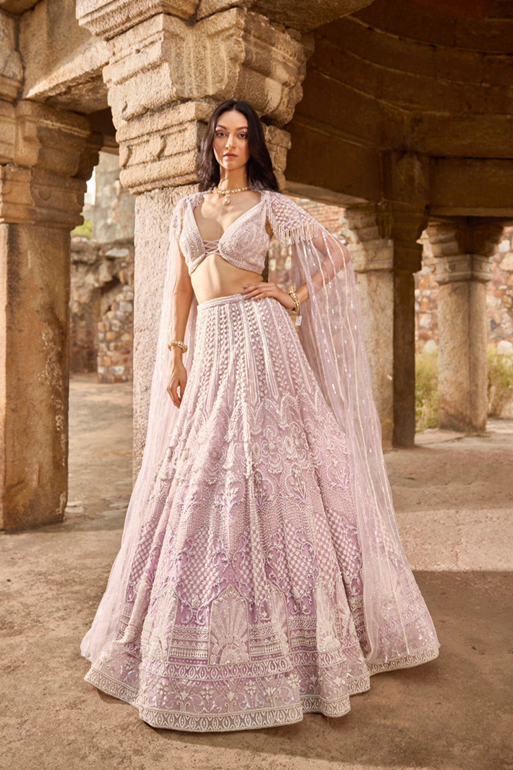 "Dhisana" Pearl Work Purple Hand Embroidered Lehenga Set With Cape