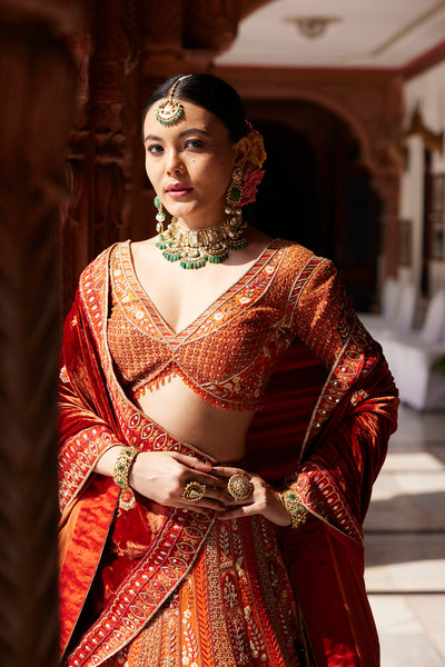 "Rewati" Rust Bridal Lehenga & Velvet Dupata